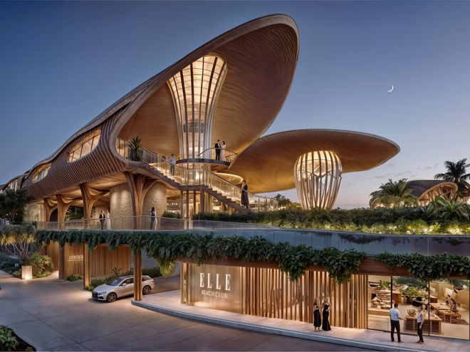 The resort entrance and retail frontage at dusk, artist impression