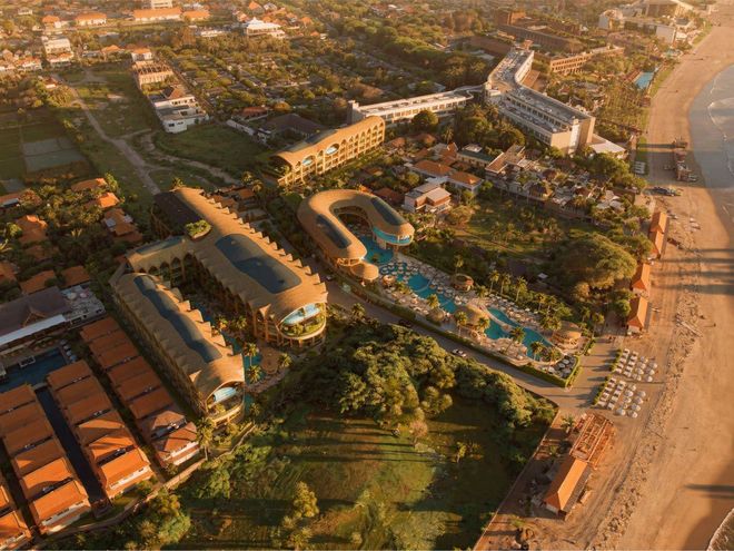Seminyak and the beachfront from the air at sunset, artist impression
